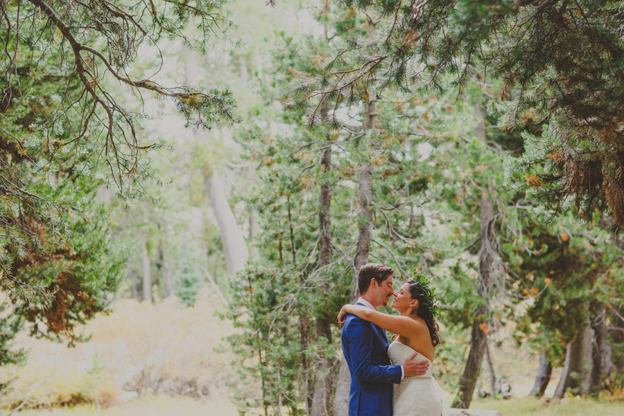 bride and groom in the woods